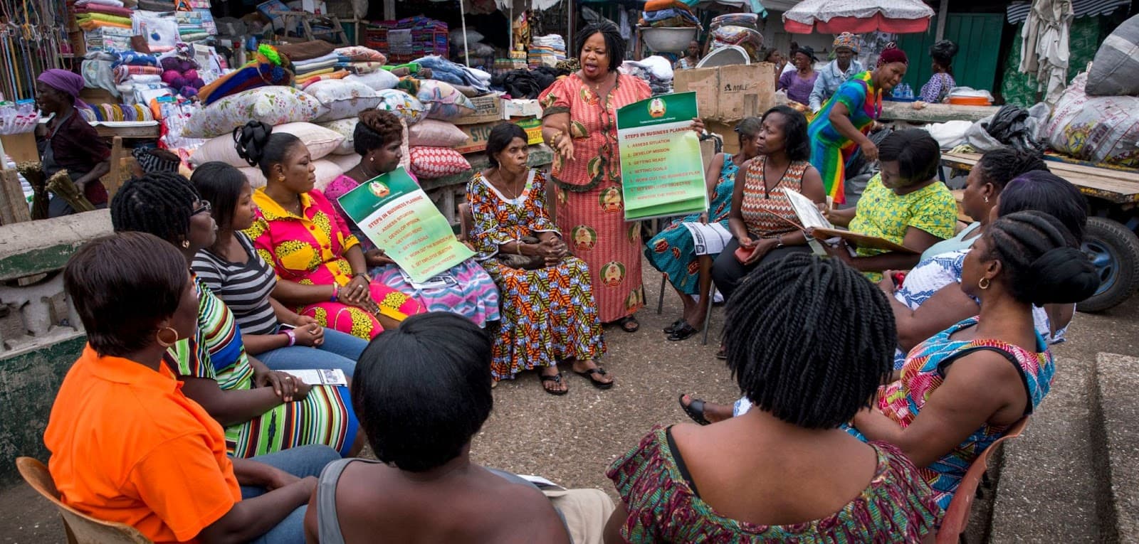 Workers gathering in a vibrant informal market